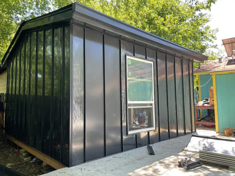 Black standing seam metal wall panels for Roof Inspection in Astoria