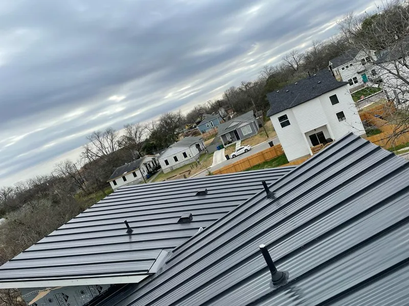 Standing seam metal roof panels with vents for Skylight Repair in Astoria
